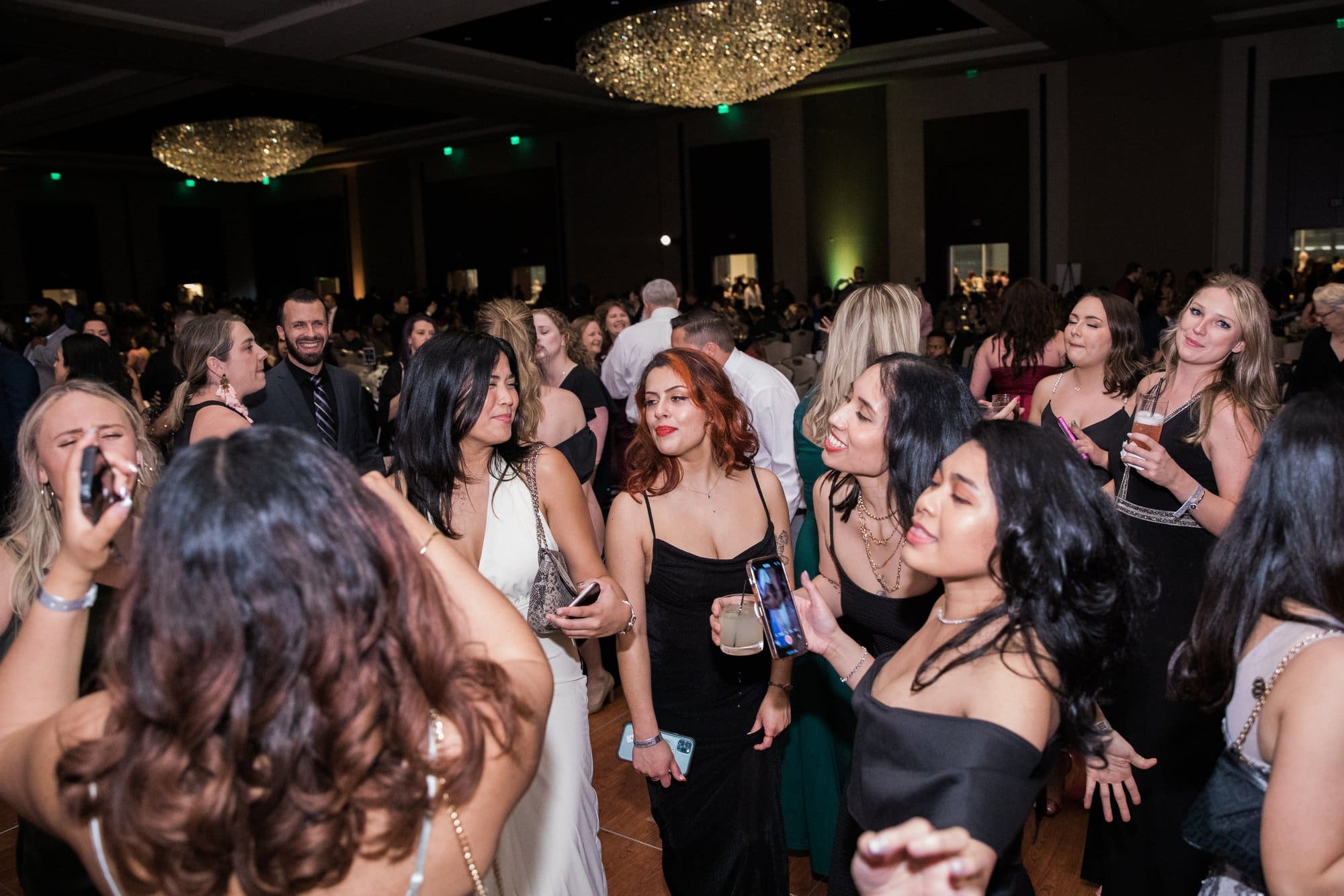 Corporate party photographer Houston: packed dance floor at a hospital employee gala